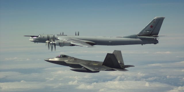 The North American Aerospace Defense Command (NORAD) said that it had to scramble two pair of U.S. F-22 fighter jets to intercept the Russian formation on Tuesday.