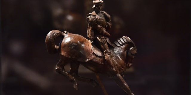 File photo - the "Horse and Rider" pictured in Milan in November 2016.
