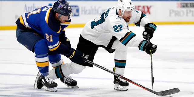 San Jose Sharks right wing Joonas Donskoi (27), of Finland, passes the puck away from St. Louis Blues center Tyler Bozak (21) during the second period in Game 6 of the NHL hockey Stanley Cup Western Conference final series Tuesday in St. Louis. (Associated Press)