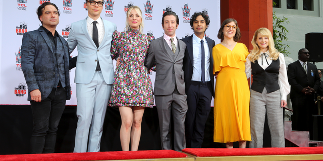 Johnny Galecki, from left, Jim Parsons, Kaley Cuoco, Simon Helberg, Kunal Nayyar, Mayim Bialik and Melissa Rauch, cast members of the TV series "The Big Bang Theory," pose at a hand and footprint ceremony at the TCL Chinese Theatre on Wednesday, May 1, 2019 at in Los Angeles.