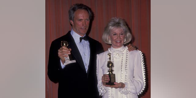 Actor Clint Eastwood and actress Doris Day attend 46th Annual Golden Globe Awards on January 28, 1989 at the Beverly Hilton Hotel in Beverly Hills, California.