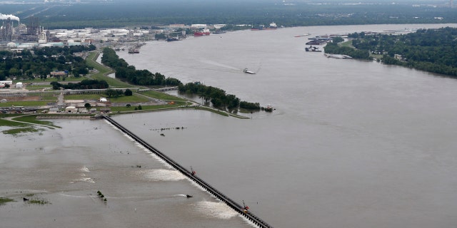 Torrential rains in Louisiana brought such a rapid rise on the river that the Army Corps of Engineers is opening the Bonnet Carre Spillway four days earlier than planned. Spokesman Ricky Boyett says the river rose six inches in 24 hours.