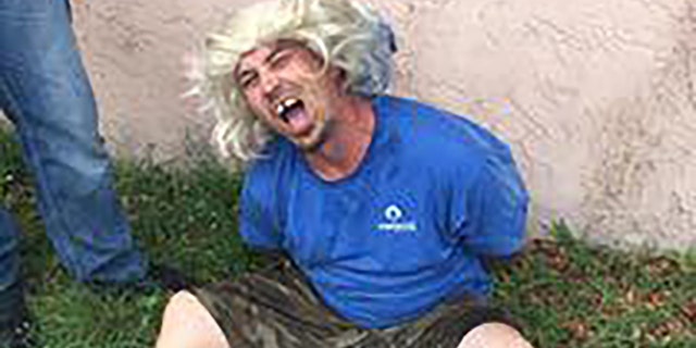 Robert “Bobby” Walls was arrested without incident after police saw through his "hideous wig" disguise, authorities said.