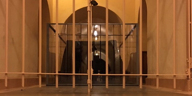 At the bottom of the bowels of the American Capitol, a small room is on two levels just before the floor of the rotunda and precisely in the dead center of the building.