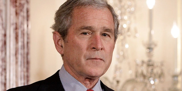 U.S. President George W. Bush and first lady Laura Bush participate in the ceremony to commemorate foreign policy achievements at the State Department in Washington January 15, 2009.