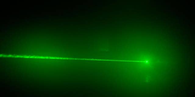 Knowingly pointing a laser beam at an aircraft is against federal law.
