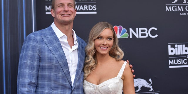 Gronkowski and Camille Kostek arrive at the Billboard Music Awards. (Photo by Richard Shotwell/Invision/AP)
