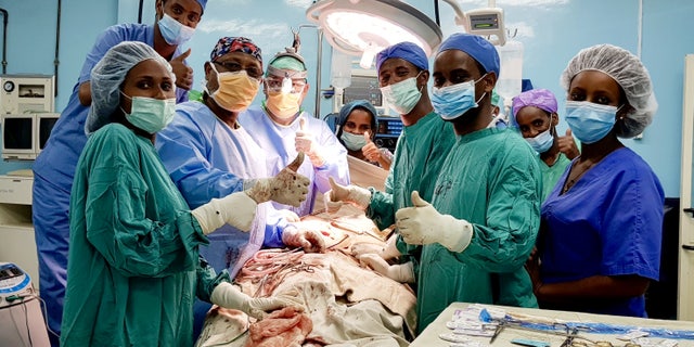 Her lead surgeon knew that the operation would require careful planning due to the risk of bleeding and organ damage.