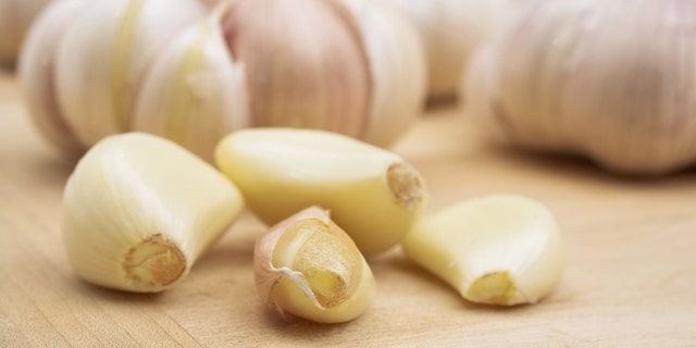 The water in the garlic steams and breaks down the bond between the clove and the skin for fast removal.