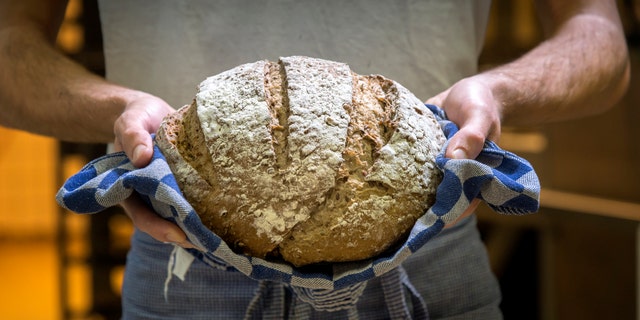 Put the dough in a microwave-safe bowl in the center of the microwave and heat on the lowest power for three minutes.