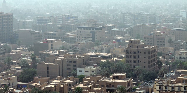 This skyline of downtown Baghdad with rooftops and terraces is a very typical urban view seen all over the Middle East.