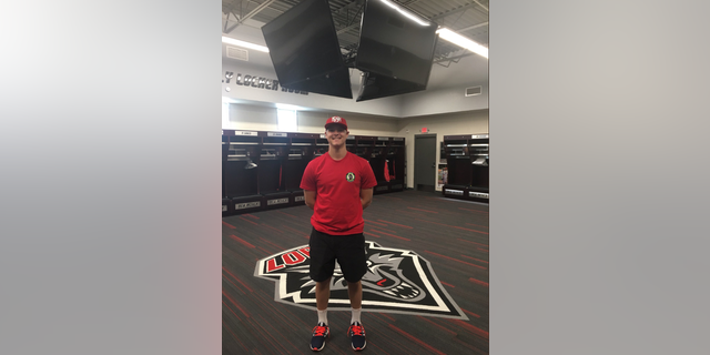 UNM pitcher Jackson Weller stands in the team's locker room. He was shot dead last weekend and the police identified a suspect.