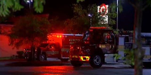 Fire crews respond to an emergency involving a commercial jet in Jacksonville, Fla., on Friday night. (WFOX-TV Jacksonville)