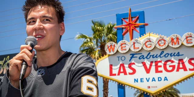 FILE - In this May 2, 2019, file photo, "Jeopardy!" sensation James Holzhauer speaks after being presented with a key to the Las Vegas Strip in front of the Welcome to Fabulous Las Vegas sign in Las Vegas. Holzhauer’s "Jeopardy" winning streak is still going and he may be track to surpass Ken Jennings’ record earnings in the next month.