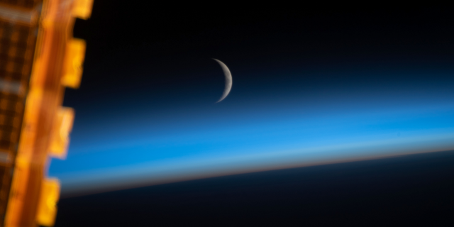 An astronaut captured this image of the crescent moon from the International Space Station while the orbiting laboratory was above the Sea of Japan.
