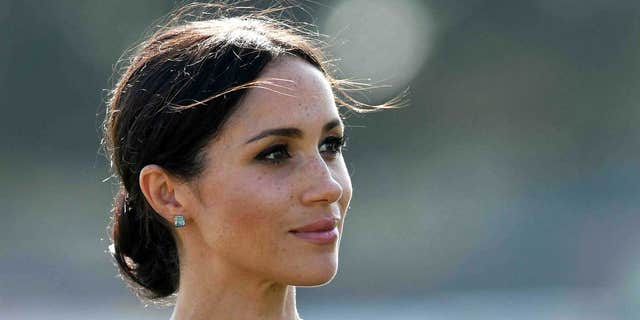 Meghan Markle was ‘emotional’ after getting in trouble for wearing necklace with Prince Harry’s initial: book - Fox News