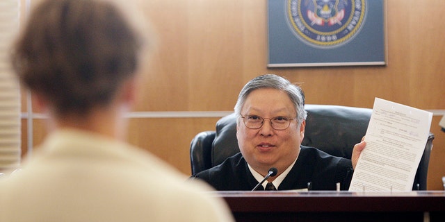 Taylorsville Judge Michael Kwan has been suspended without pay for six months for comments he made online and in court criticizing President Trump.