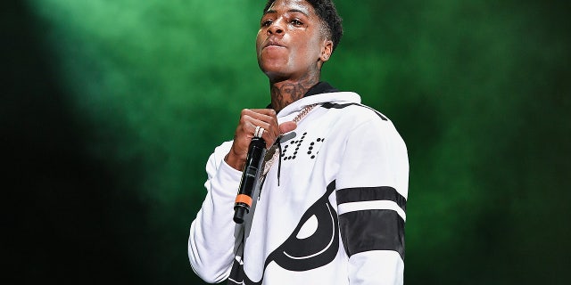 Rapper NBA Youngboy's girlfriend was injured in a deadly shootout in Miami. The melee reportedly occurred outside of a Trump resort.