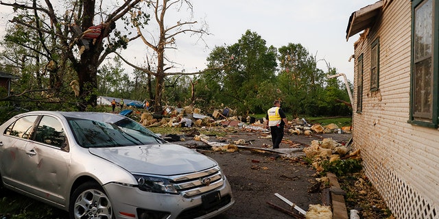 Storm damage litters a residential neighborhood, Tuesday, May 28, 2019, in Vandalia, Ohio.