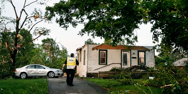 Storm damage litters a residential neighborhood, Tuesday, May 28, 2019, in Dayton, Ohio.