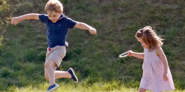 Prince George of Cambridge and Princess Charlotte of Cambridge attend the Maserati Royal Charity Polo Trophy at the Beaufort Polo Club on June 10, 2018 in Gloucester, England.