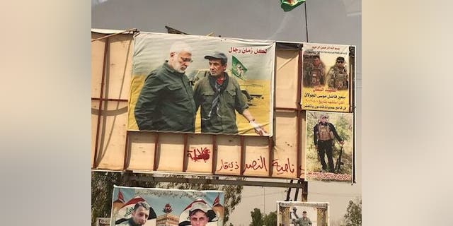 A poster of Qassem Soleimani adorns the entrance of the Iraqi city of Tel Afar in the months after it was liberated from ISIS.