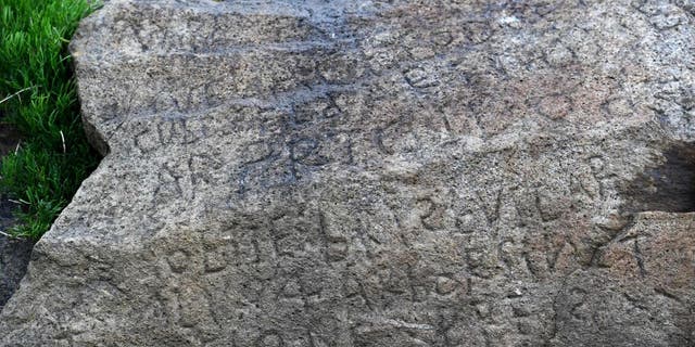At low-tide, a rock inscribed with a 230-year-old code emerges on a beach in France. The town where it's located is now offering a bounty to anyone who can decipher the writing inscribed there.