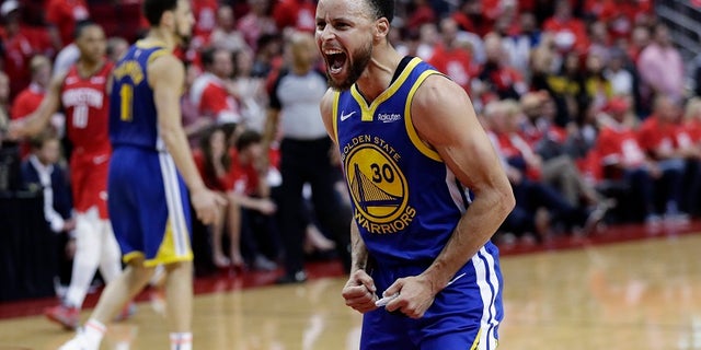 Golden State Warriors guard Stephen Curry (30) celebrates the team's win over Houston in Game 6 of a second-round NBA basketball playoff series, Friday, May 10, 2019, in Houston. Golden State won 118-113, winning the series. (AP Photo/Eric Gay)