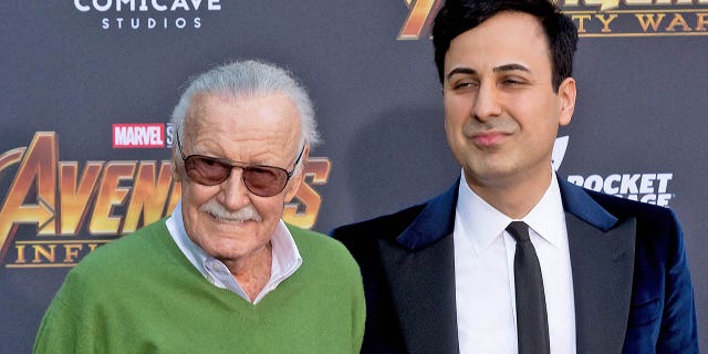Marvel creator Stan Lee poses with former business manager Keya Morgan at the "Avengers: Infinity War" premiere in Los Angeles in April 2018.