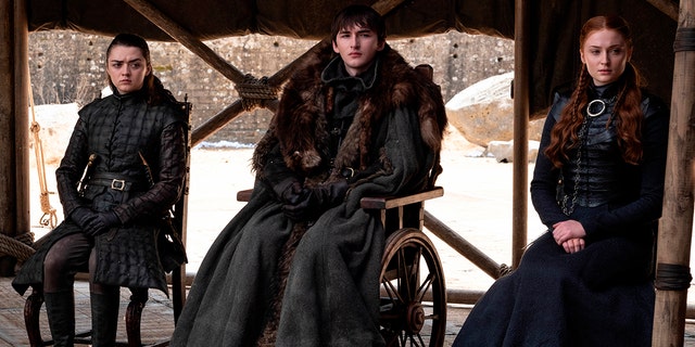 This image released by HBO shows from left to right Maisie Williams, Isaac Hempstead Wright and Sophie Turner in a scene from the last episode of 
