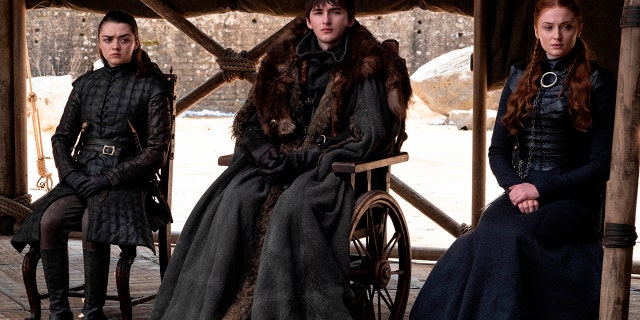 This image released by HBO shows from left to right Maisie Williams, Isaac Hempstead Wright and Sophie Turner in a scene from the last episode of 