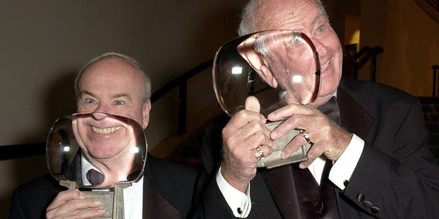 Tim Conway, left, and Harvey Korman hold up their awards. (Photo by M. Caulfield/WireImage)