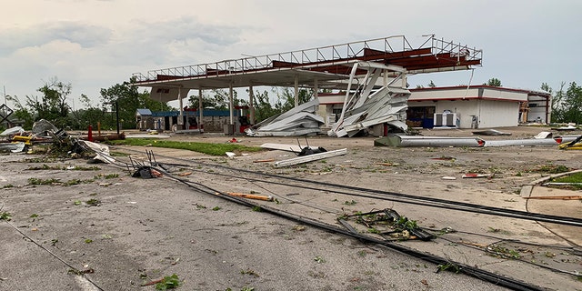 Damage in Jefferson City, Missouri after a "large and destructive tornado" was reported shortly before midnight.