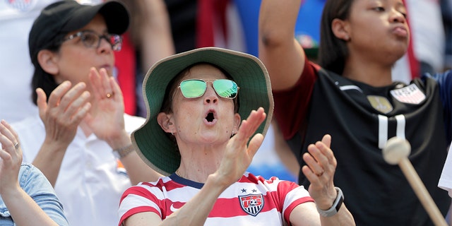 A spectator reacting during the send-off celebration for the United States. (AP Photo/Julio Cortez)