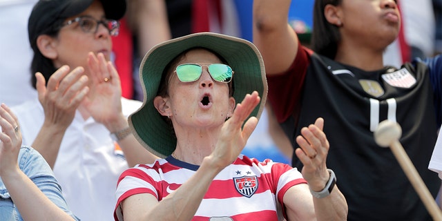 A spectator reacting during the send-off celebration for the United States. (AP Photo/Julio Cortez)