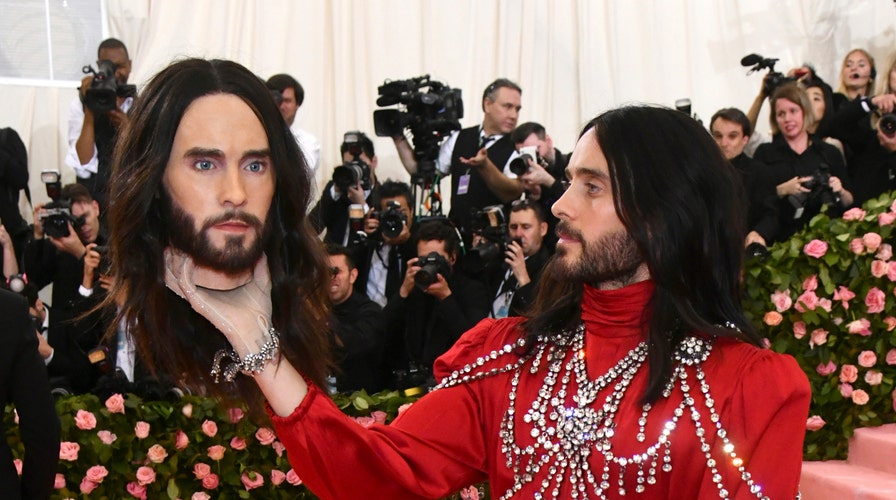 Jared Leto carries a replica of his head at Met Gala