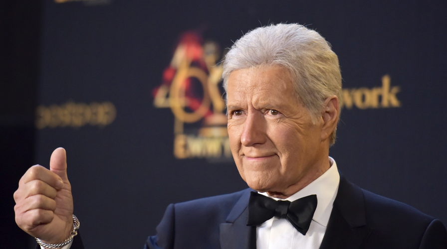 ‘Jeopardy!’ host Alex Trebek is leading his life ‘with dignity' amid cancer treatments, says Rob Belushi