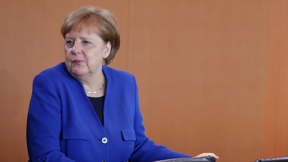 Angela Merkel vows to leave politics for good after 4th term