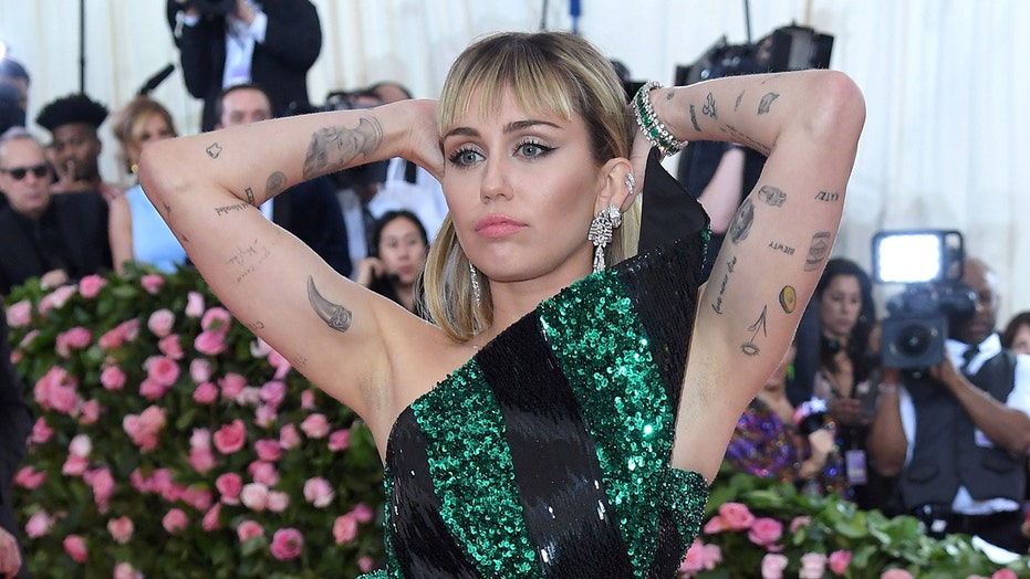 Miley Cyrus Poses Topless As She Gets Ready For The 2019 Met Gala