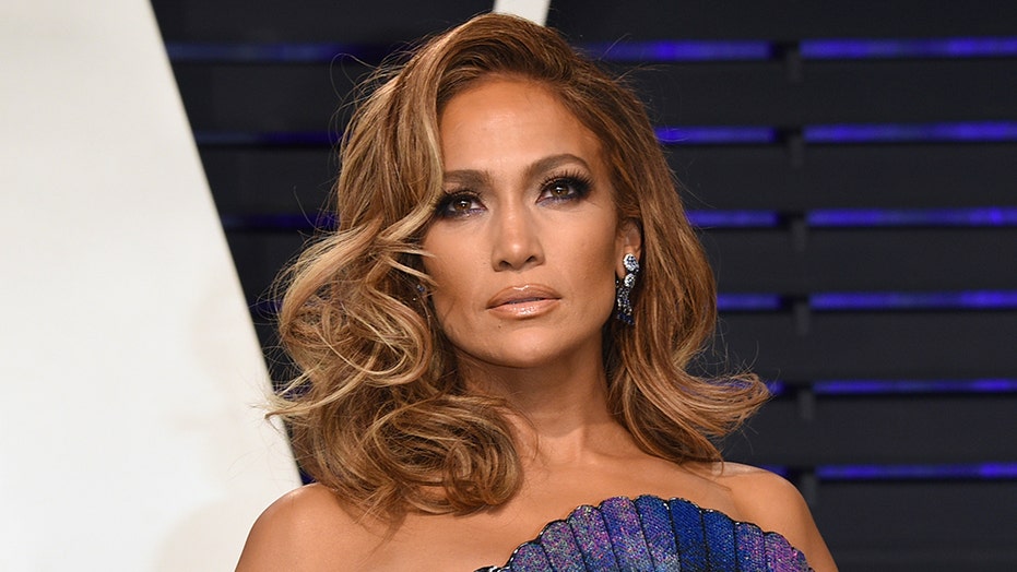 Jennifer Lopez breaks out iconic Versace dress for 'SNL': 'Some ...