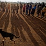 South Africans queue in the early morning sun to cast their votes in the mining settlement of Bekkersdal, west of Johannesburg, May 8, 2019. 