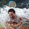 Houston Astros catcher Garrett Stubbs is doused with water after a baseball game against the Chicago Cubs in Houston, May 28, 2019.