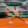 Switzerland's Roger Federer plays a shot against Germany's Oscar Otte during their second round match of the French Open tennis tournament in Paris, May 29, 2019.