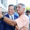 A fan takes a selfie picture with Ed Henry at Fox Nation's inaugural fan summit.