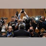 Attorney General William Barr is photographed as he sits down to testify before the Senate Judiciary Committee on Capitol Hill in Washington, May 1, 2019. 