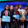 The eight co-champions of the 2019 Scripps National Spelling Bee, from left, Shruthika Padhy, 13, of Cherry Hill, N.J., Erin Howard, 14, of Huntsville, Ala., Rishik Gandhasri, 13, of San Jose, Calif., Christopher Serrao, 13, of Whitehouse Station, N.J., Saketh Sundar, 13, of Clarksville, Md., Sohum Sukhatankar, 13, of Dallas, Texas, Rohan Raja, 13, of Irving, Texas, and Abhijay Kodali, 12, of Flower Mound, Texas, hold the trophy at the end of the competition in Oxon Hill, Maryland, May 31, 2019. 