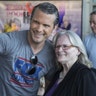 Pete Hegseth takes a picture with a loyal Fox News fan at the Fox Nation summit.