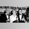 Doris Day, poses with Tony Curtis, right, and Buddy Adler at the Hollywood Foreign Press Association's annual awards dinner in the Cocoanut Grove in Los Angeles. Day, whose wholesome screen presence stood for a time of innocence in '60s films, has died, her foundation says. . (AP Photo, File)