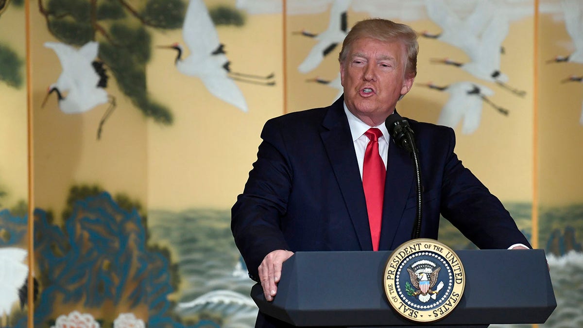 President Donald Trump speaks to Korean business leaders in Seoul on Sunday. (Associated Press)