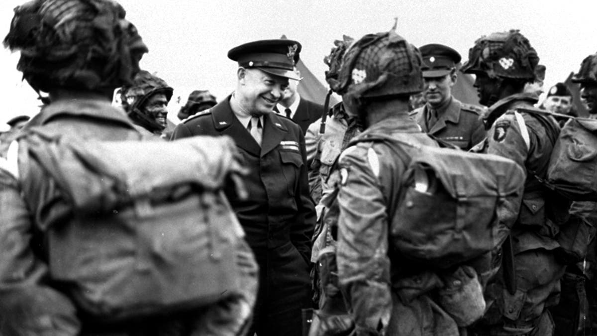 General Dwight Eisenhower assigns orders to paratroopers on D-Day